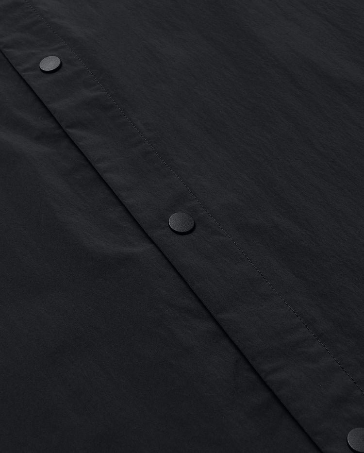 109891-008 | MEN'S K-SWISS LOGO LOOSE FIT SHORT SLEEVES SHIRT | BLACK