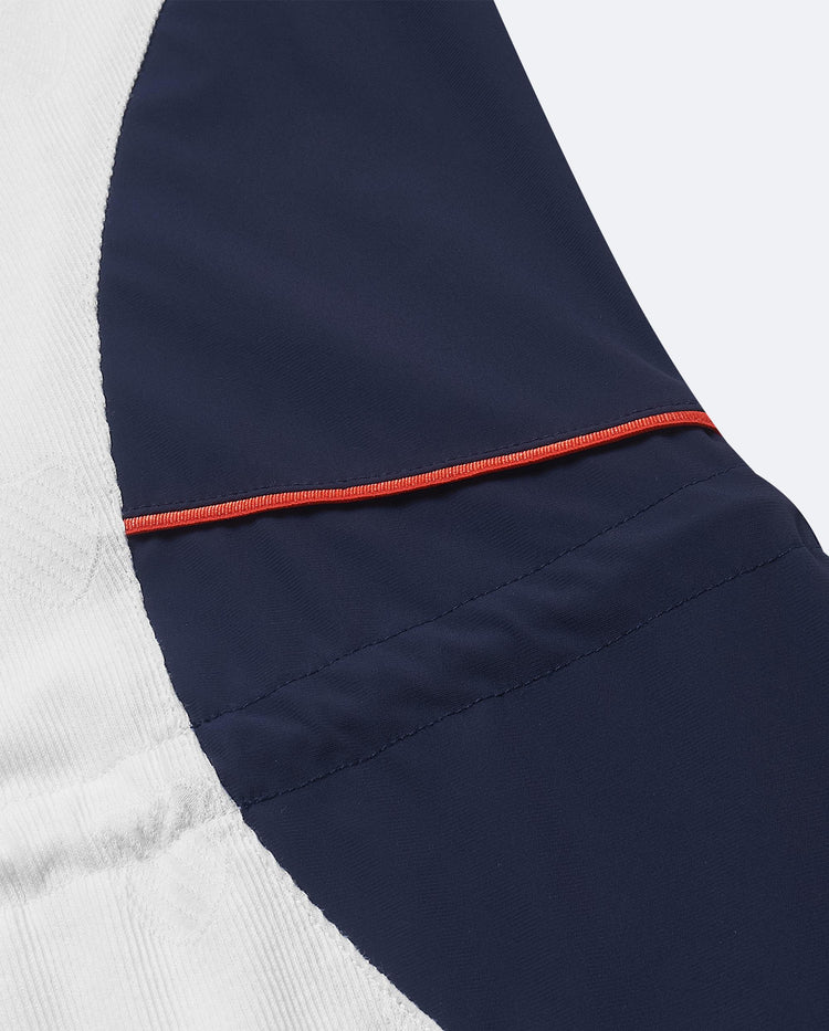 197189-100 | WOMEN'S ALL-OVER LOGO COLOR BLOCKS POLO DRESS | WHITE