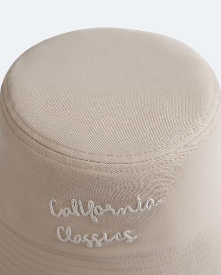 C3561-967 | K-SWISS LOGO TEDDY FLEECE REVERSIBLE HAT | HOT CORAL